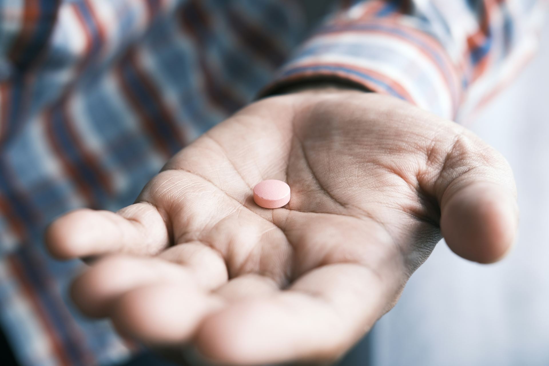 Pill in a hand